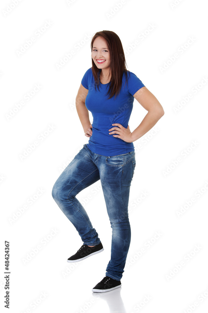 Happy casual woman with one leg up Happy casual woman with one leg up