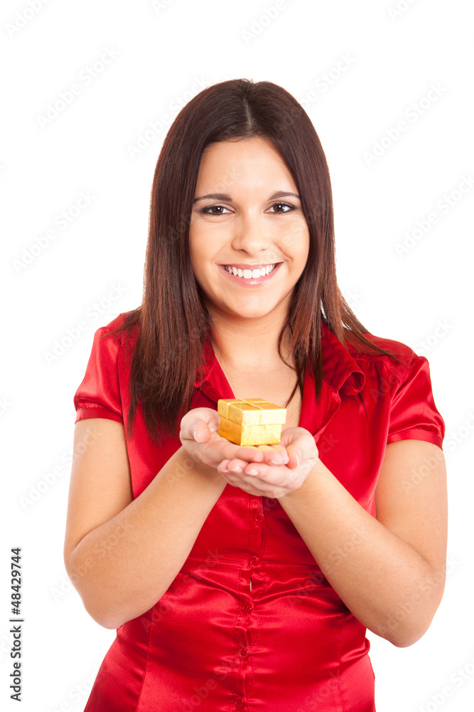 Beautiful woman holding presents while smiling Beautiful woman holding presents while smiling