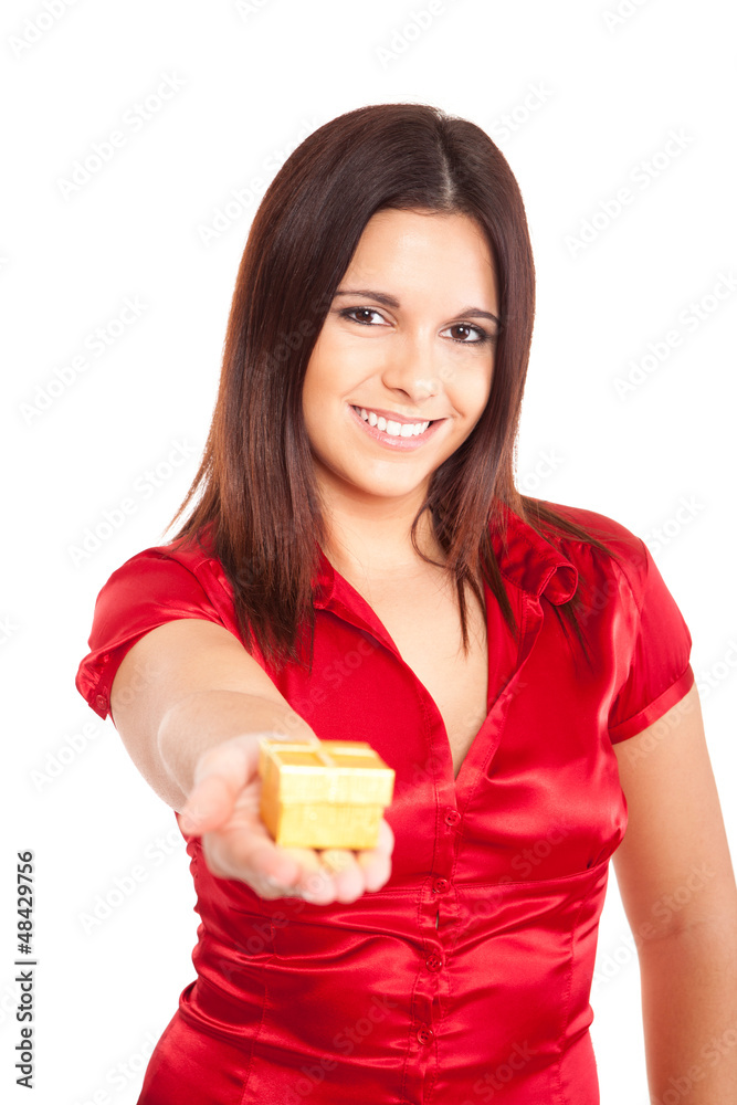 Beautiful woman holding presents while smiling Beautiful woman holding presents while smiling