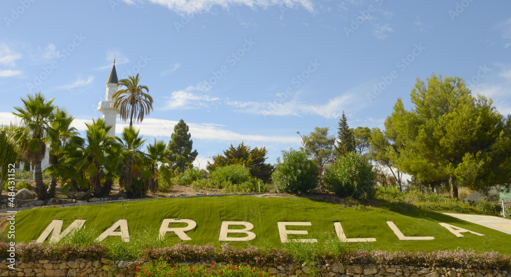 The word of Marbella (Spain) on the grass.