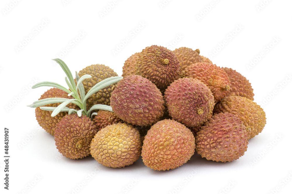 fresh lychees on white background