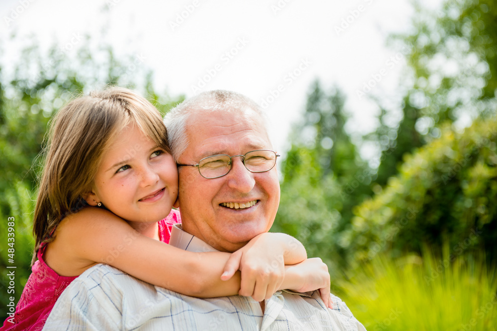 Happy grandfather with grandchild