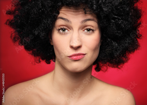 Fotografie Young woman being suspicious
