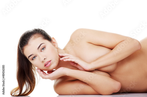 Sexy naked woman lying down