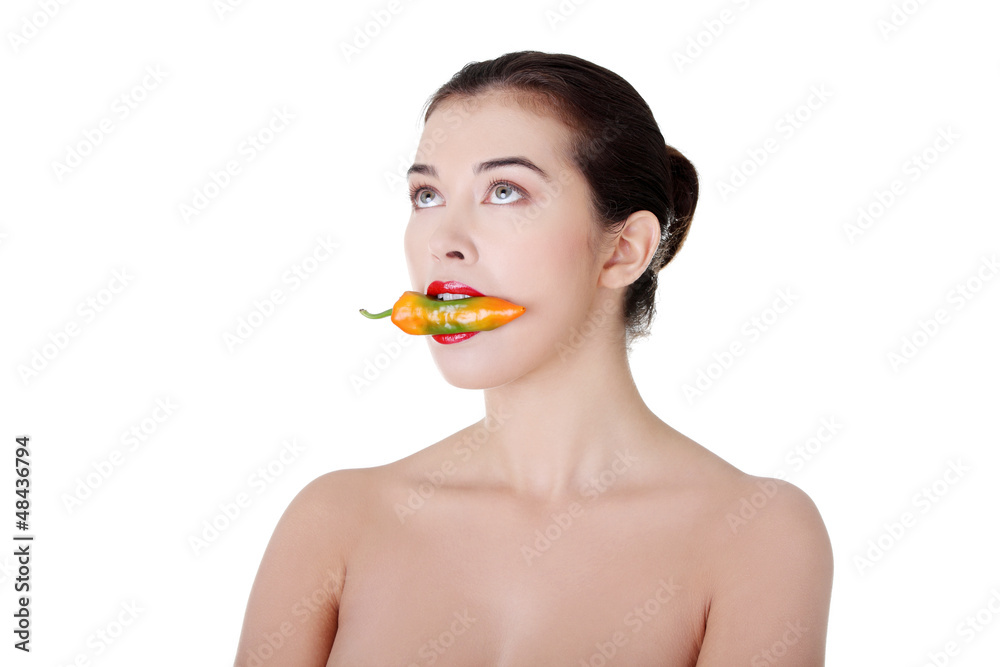 Beautiful woman with hot paprika Beautiful woman with hot paprika