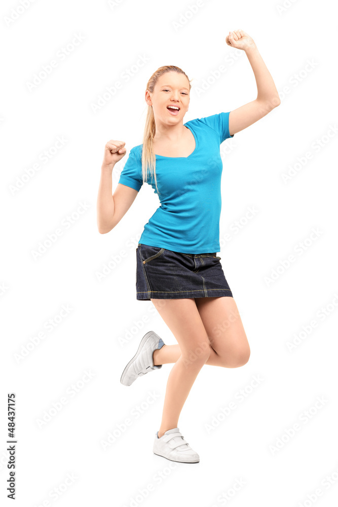 Full length portrait of an excited and happy young female Full length portrait of an excited and happy young female