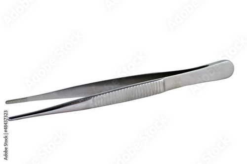 Fotografiet a Medical image of metallic tweezers close-up