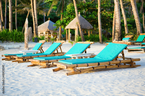 Deckchairs at the perfect white sand beach on Boracay, Philippin