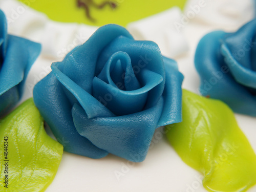 Baptism cake, white sugar paste, blue roses photo