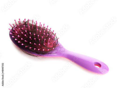 comb brush with lost hair  isolated on white