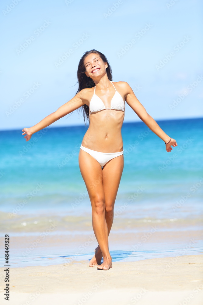 Beach summer holidays bikini woman carefree freedom