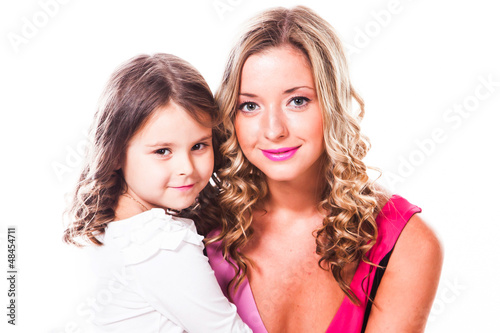 Young and beautiful mother with a beautiful daughter