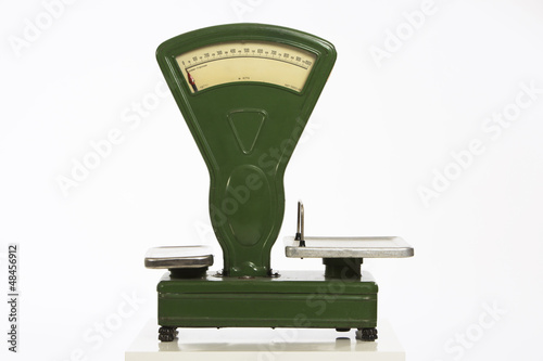 Green, rero style (1960s-1970s) food scale on white background.