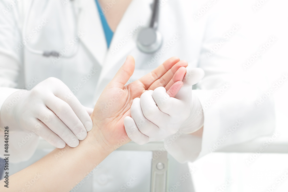 Hands of the patient and the doctor Hands of the patient and the doctor
