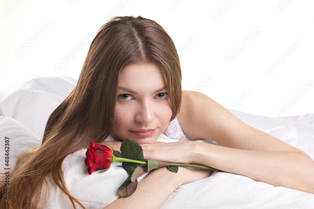 beautiful woman with rose in a bed beautiful woman with rose in a bed