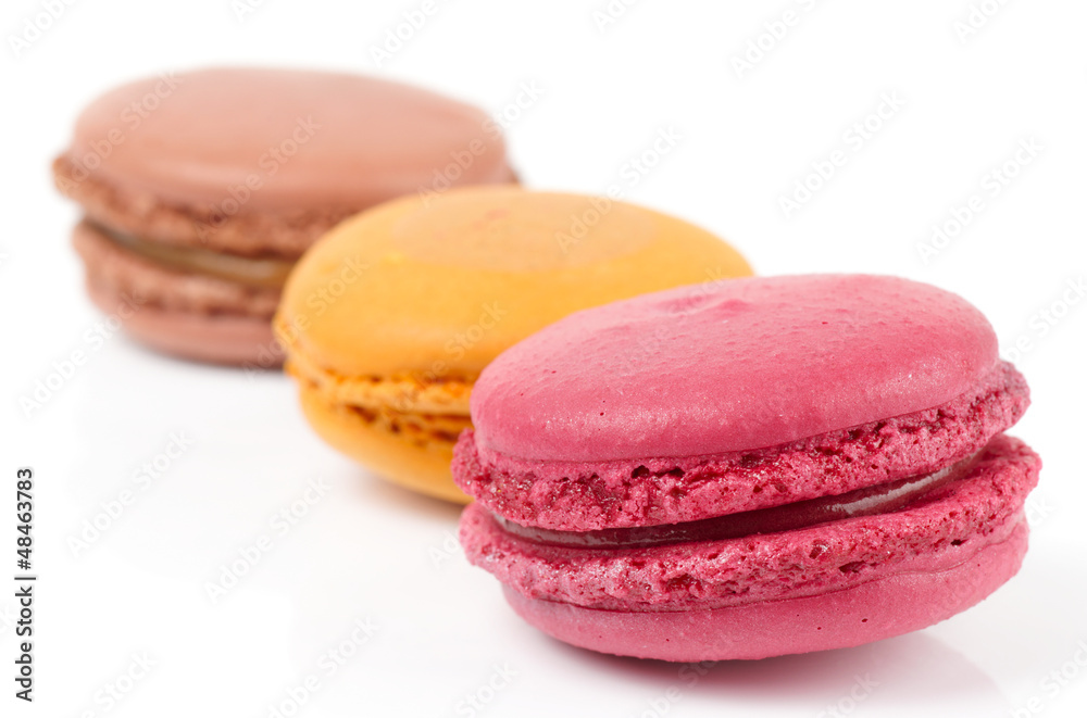 Three colorful macarons isolated on white Three colorful macarons isolated on white