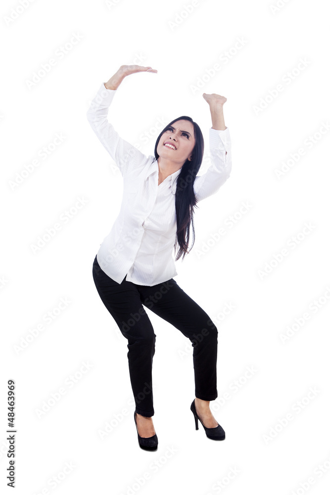 Fototapeta premium Businesswoman pushing something