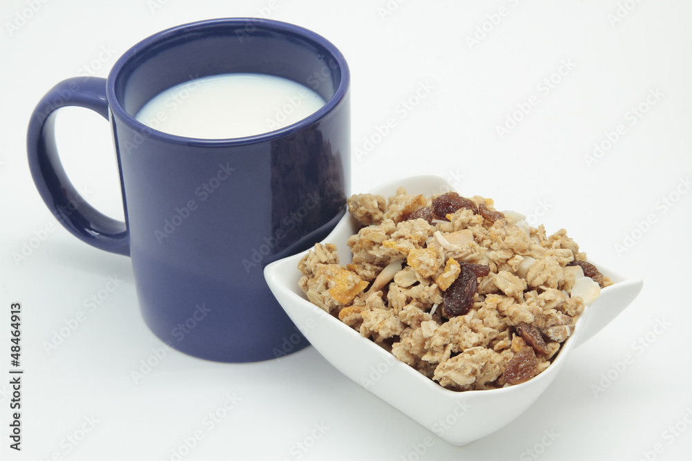 blue mug of breakfast with milk and cereals blue mug of breakfast with milk and cereals