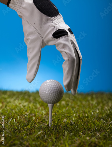Hand and golf ball