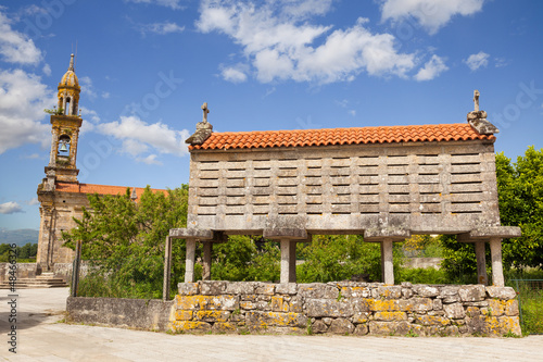 Typical horreo (granary) in the province of La Coruña, Spain photo