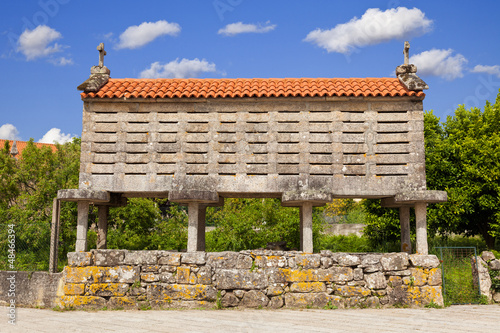 Typical horreo (granary) in the province of La Coruña, Spain photo