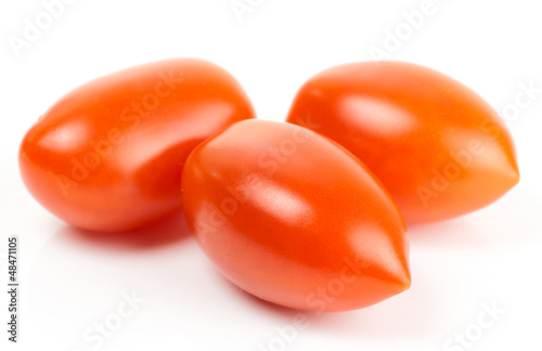 Cherry tomatoes isolated on white background