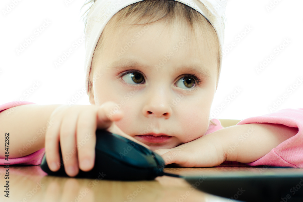 Cute baby looking into the laptop Cute baby looking into the laptop