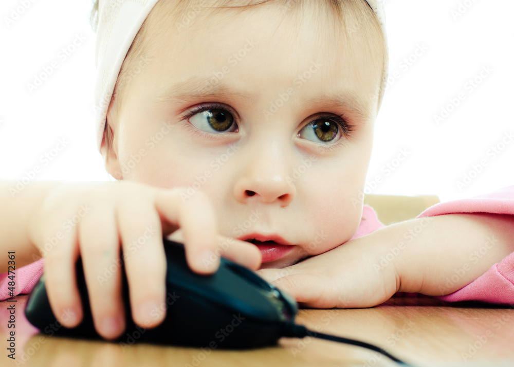Cute baby looking into the laptop Cute baby looking into the laptop