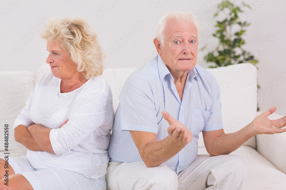 Woman being angry against a missunderstanding man Woman being angry against a missunderstanding man