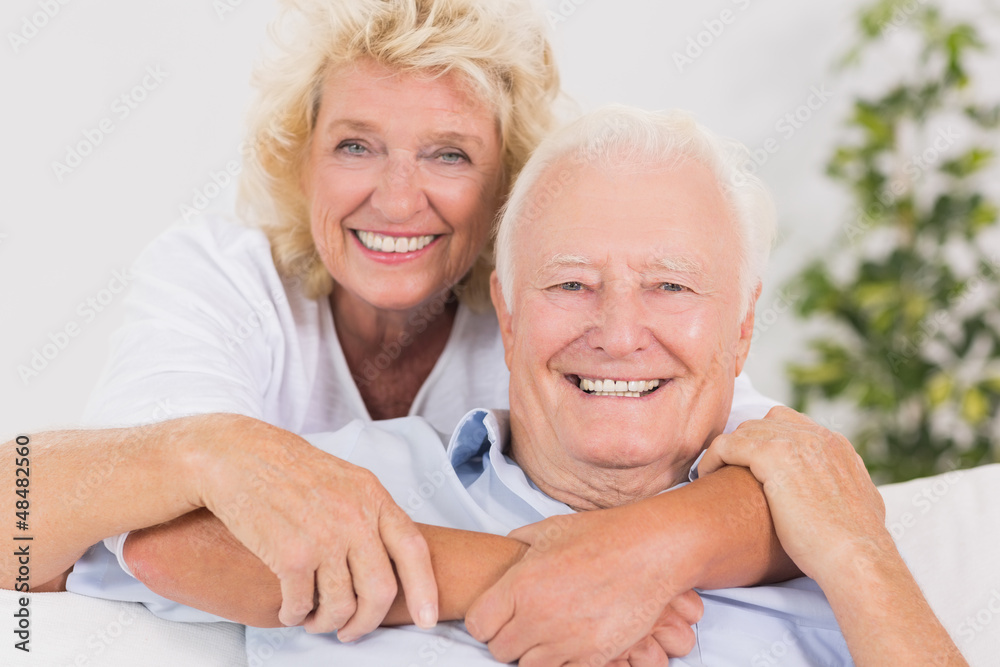 Happy old couple portrait hugging Happy old couple portrait hugging