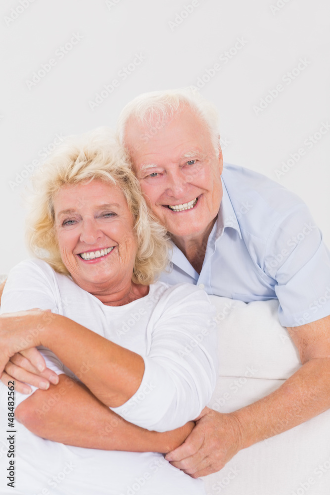 Smiling old couple hugging Smiling old couple hugging