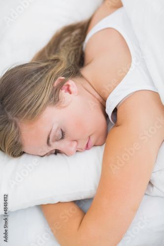 Overhead view of serene woman sleeping