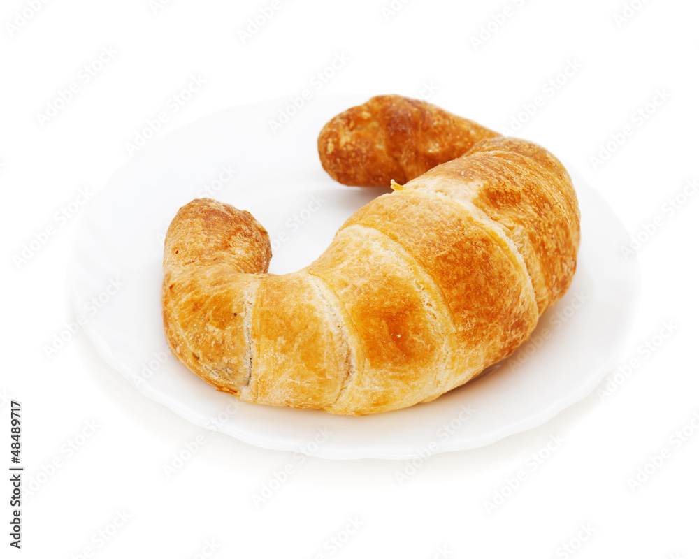 fresh and tasty croissant isolated on white background fresh and tasty croissant isolated on white background