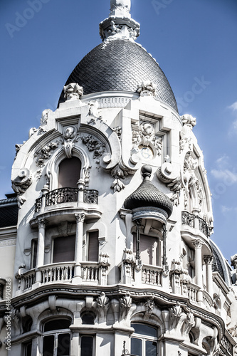 Facade of white building in Madrid, Spain photo