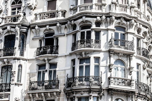 Facade of white building in Madrid, Spain photo