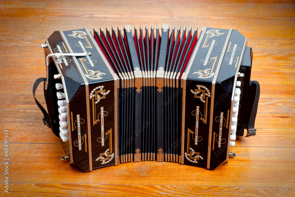 Traditional tango musical instrument, called bandoneon. - obrazy, fototapety, plakaty 