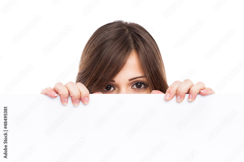 Portrait of a young woman with blank billboard Portrait of a young woman with blank billboard