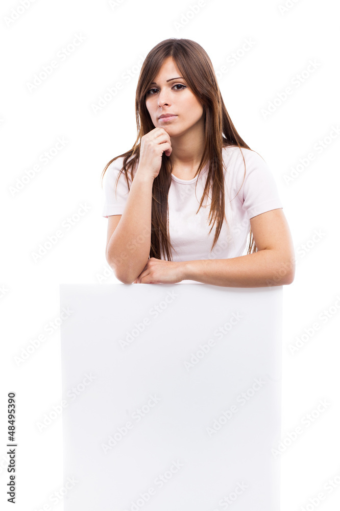 Portrait of a young woman with blank billboard Portrait of a young woman with blank billboard