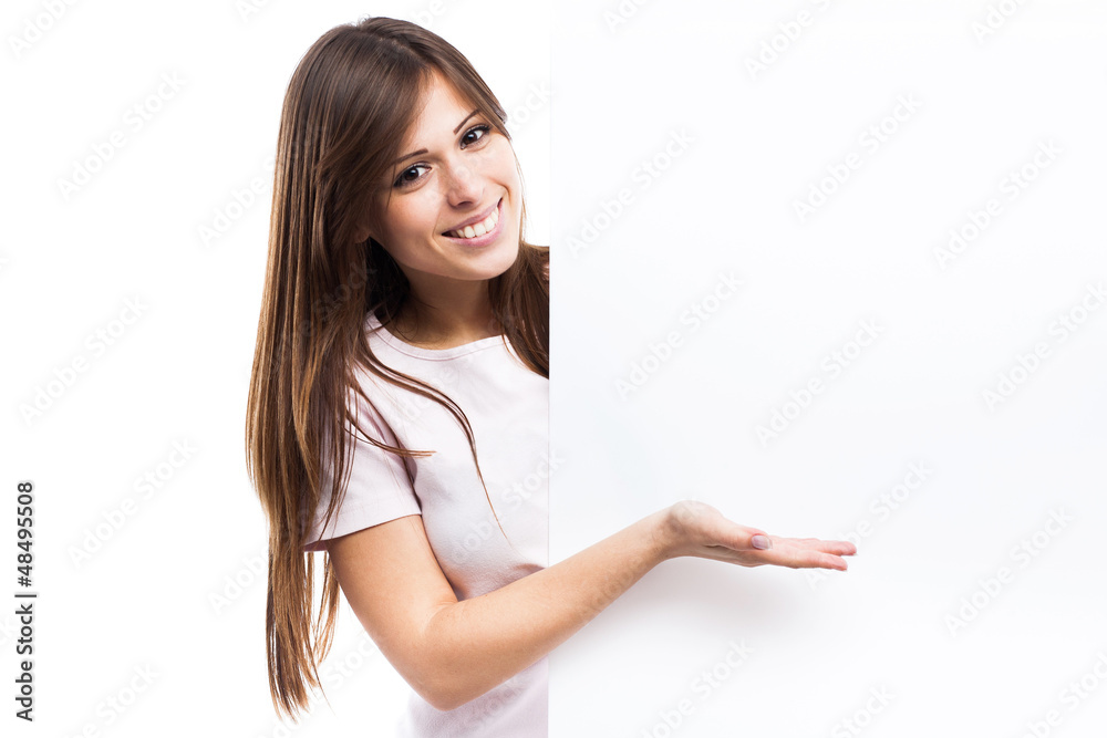 Portrait of a young woman with blank billboard Portrait of a young woman with blank billboard