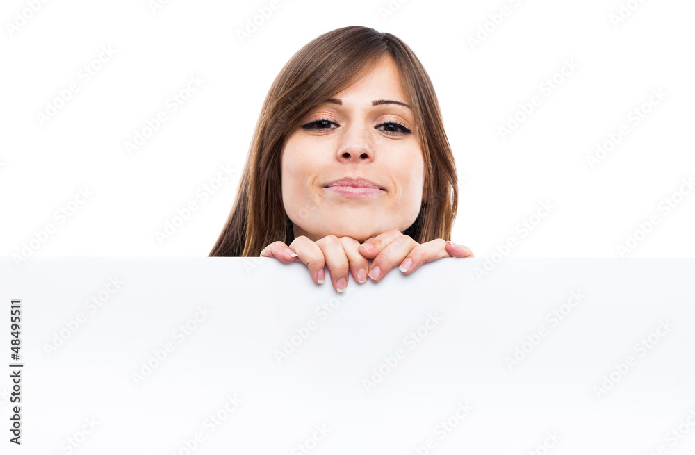 Portrait of a young woman with blank billboard Portrait of a young woman with blank billboard