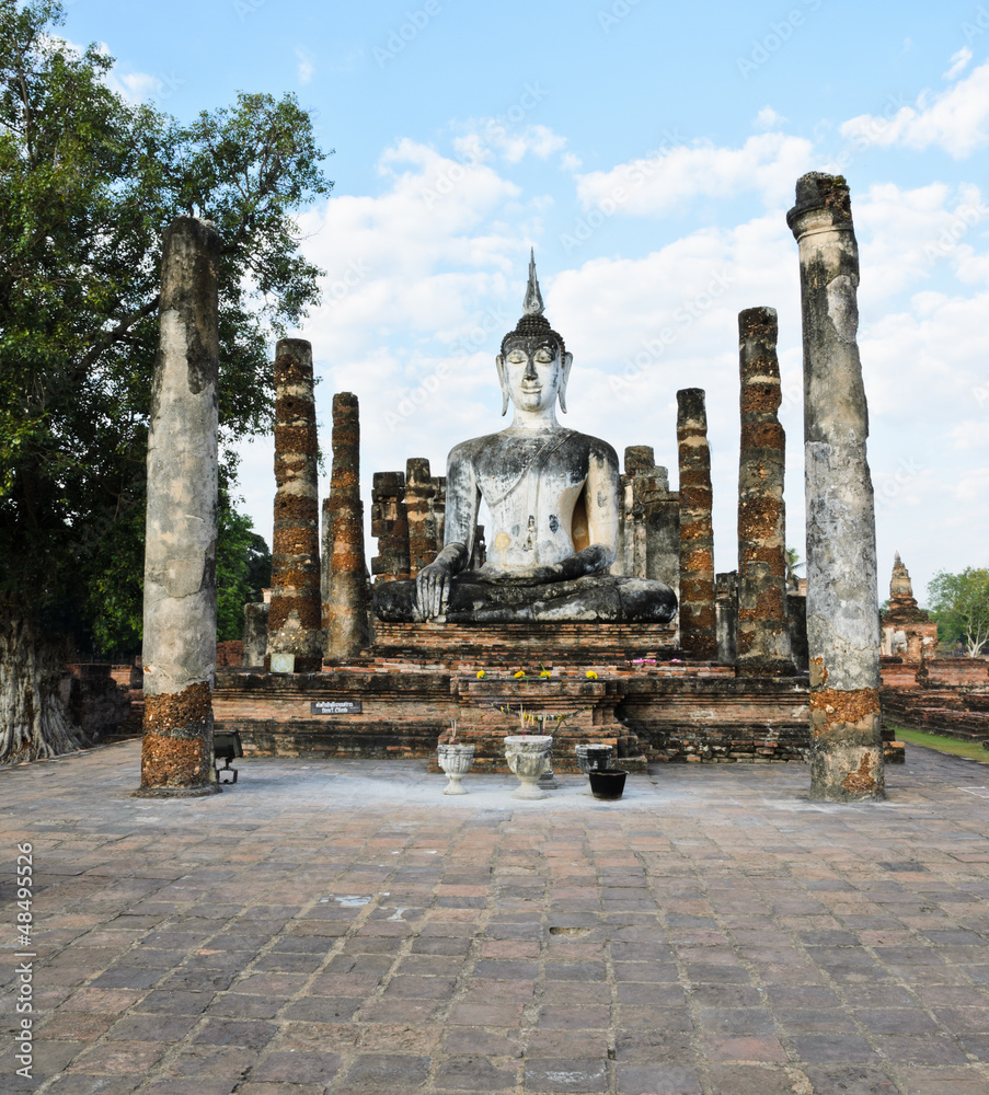Ancient stone Buddha in Sukhothai Historical Park, Thailand