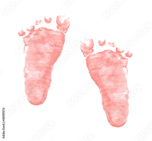 imprints of baby girl feet on white background