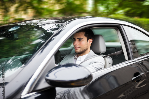 Man driving his car