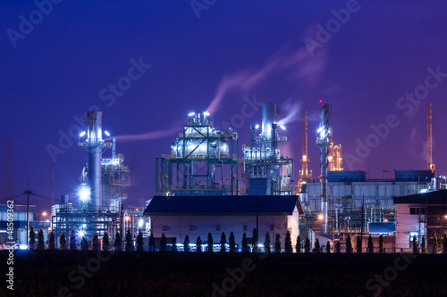 oil refinery plant and smoke at twilight morning
