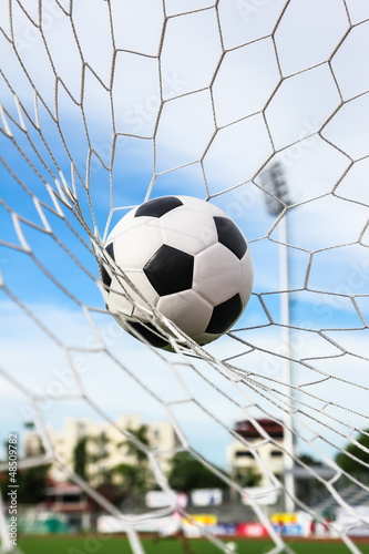 soccer ball in goal net © tungphoto