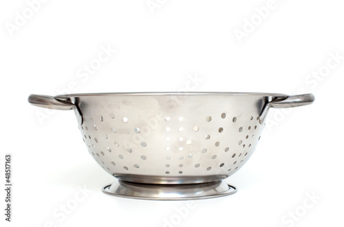 Single strainer on a white background.