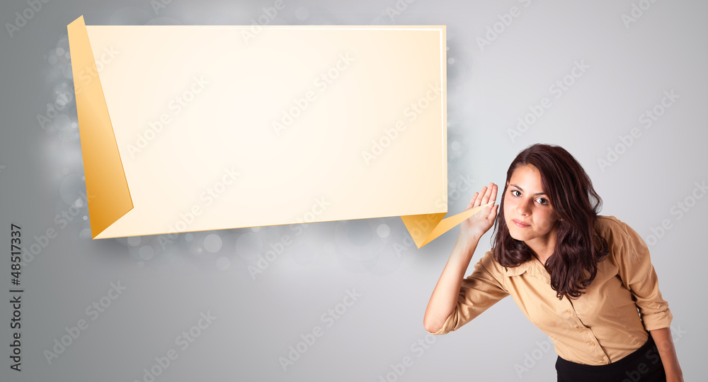young woman gesturing with modern origami copy space