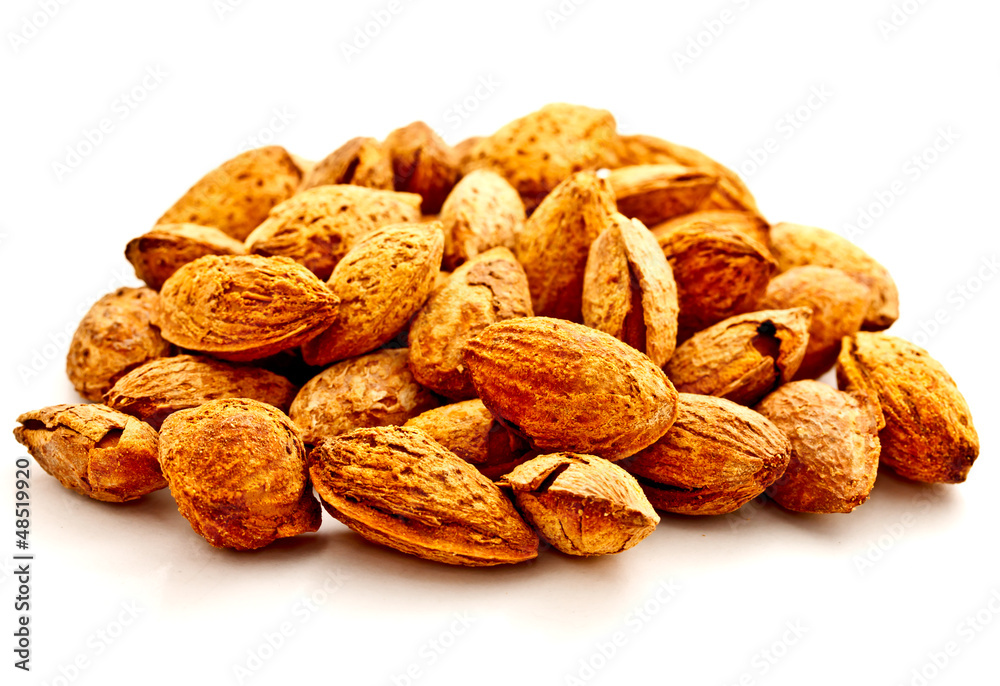 group of almond nuts on white background group of almond nuts on white background