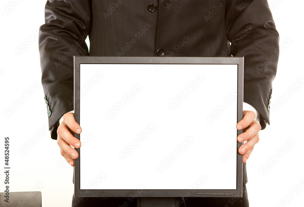 Office worker holding blank computer monitor Office worker holding blank computer monitor