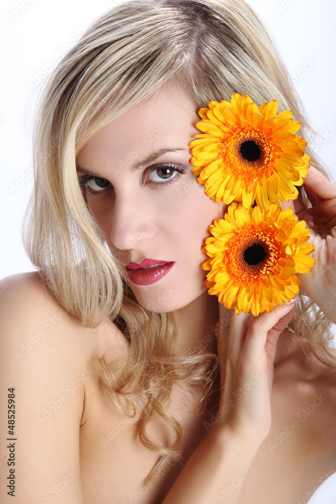 beautiful blond girl with gerber daisy flower on a white backgro beautiful blond girl with gerber daisy flower on a white backgro
